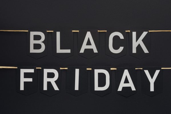 black friday lettering on flag garlands in lines on black