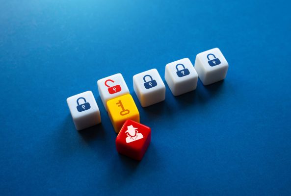 Intruder gains access to secrets. Hacker hacking into the security system. Data leakage, industrial espionage. Crypto theft, computer viruses. Authentication. Electronic encryption key.